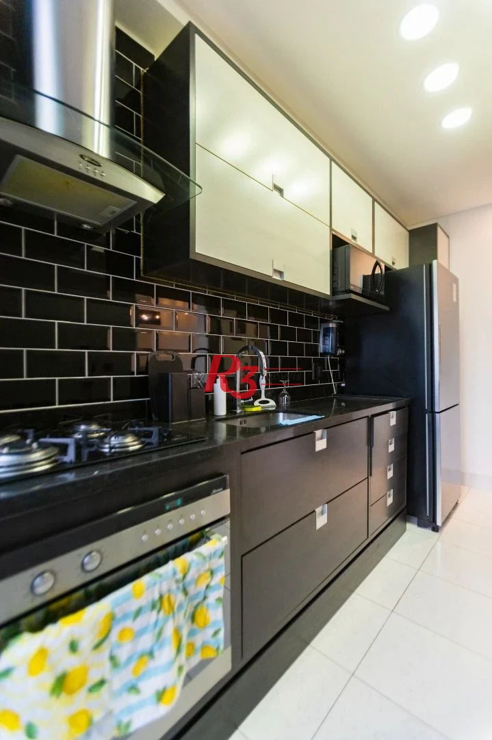 Apartamento com 2 dormitórios à venda, 62 m² por R$ 430.000,00 - Areia Branca - Santos/SP