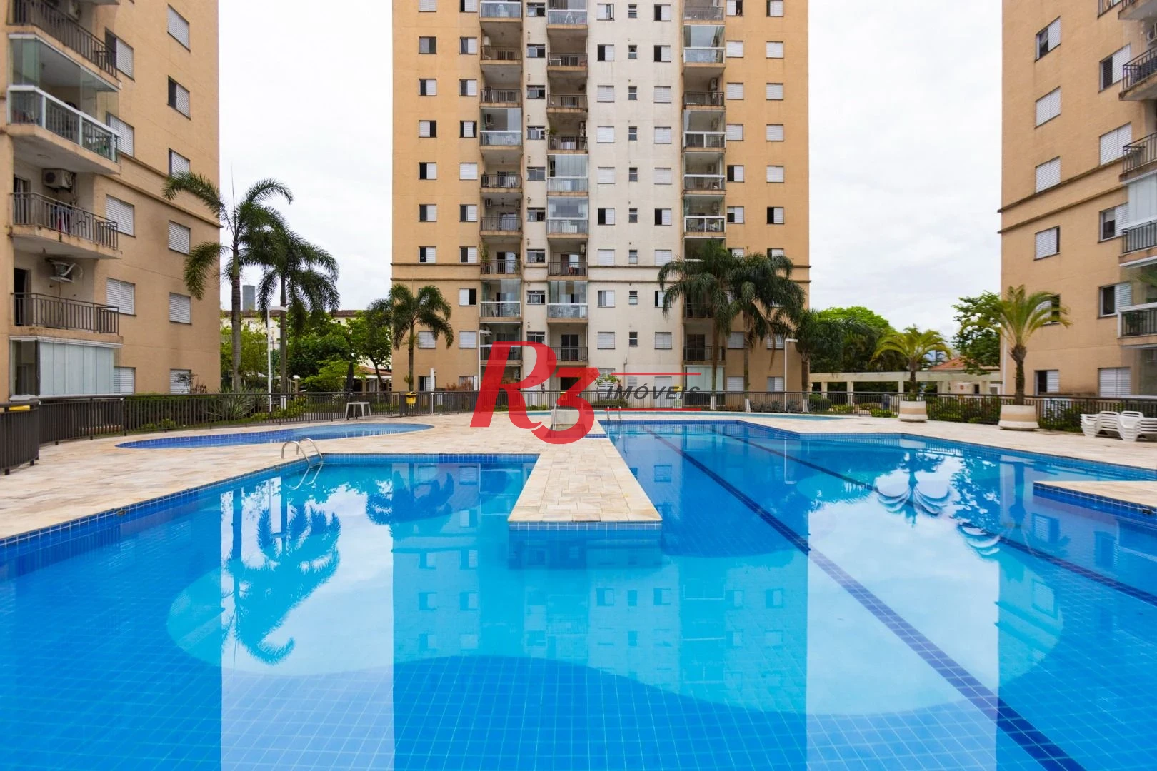 Apartamento com 2 dormitórios à venda, 62 m² por R$ 430.000,00 - Areia Branca - Santos/SP