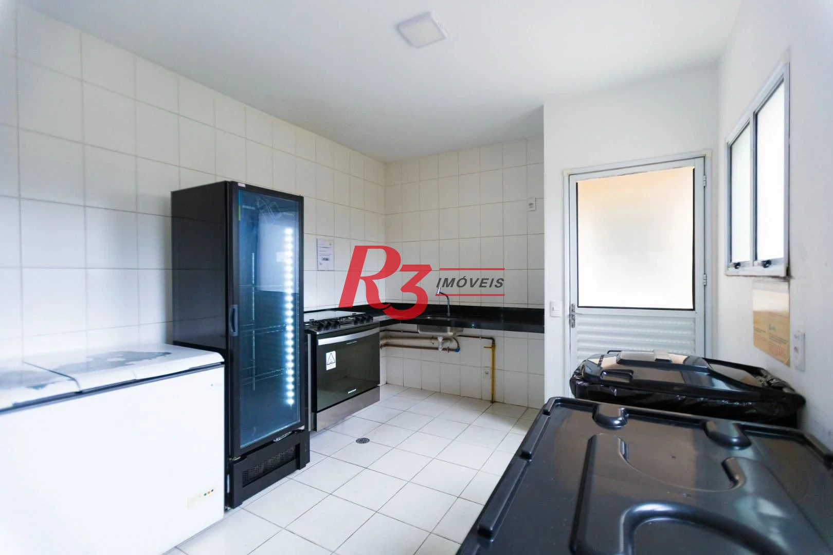 Apartamento com 2 dormitórios à venda, 62 m² por R$ 430.000,00 - Areia Branca - Santos/SP