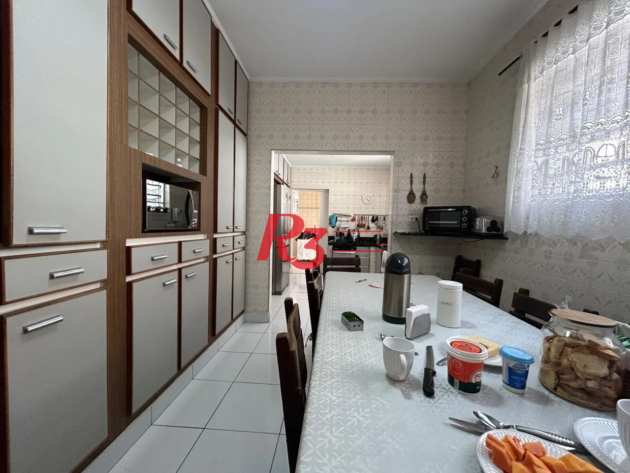 Casa com 4 dormitórios à venda, 350 m² por R$ 6.390.000,00 - Ponta da Praia - Santos/SP