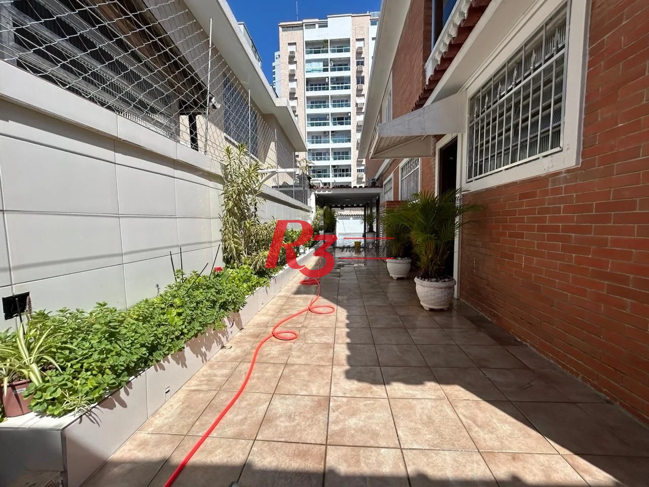Casa com 4 dormitórios à venda, 350 m² por R$ 6.390.000,00 - Ponta da Praia - Santos/SP
