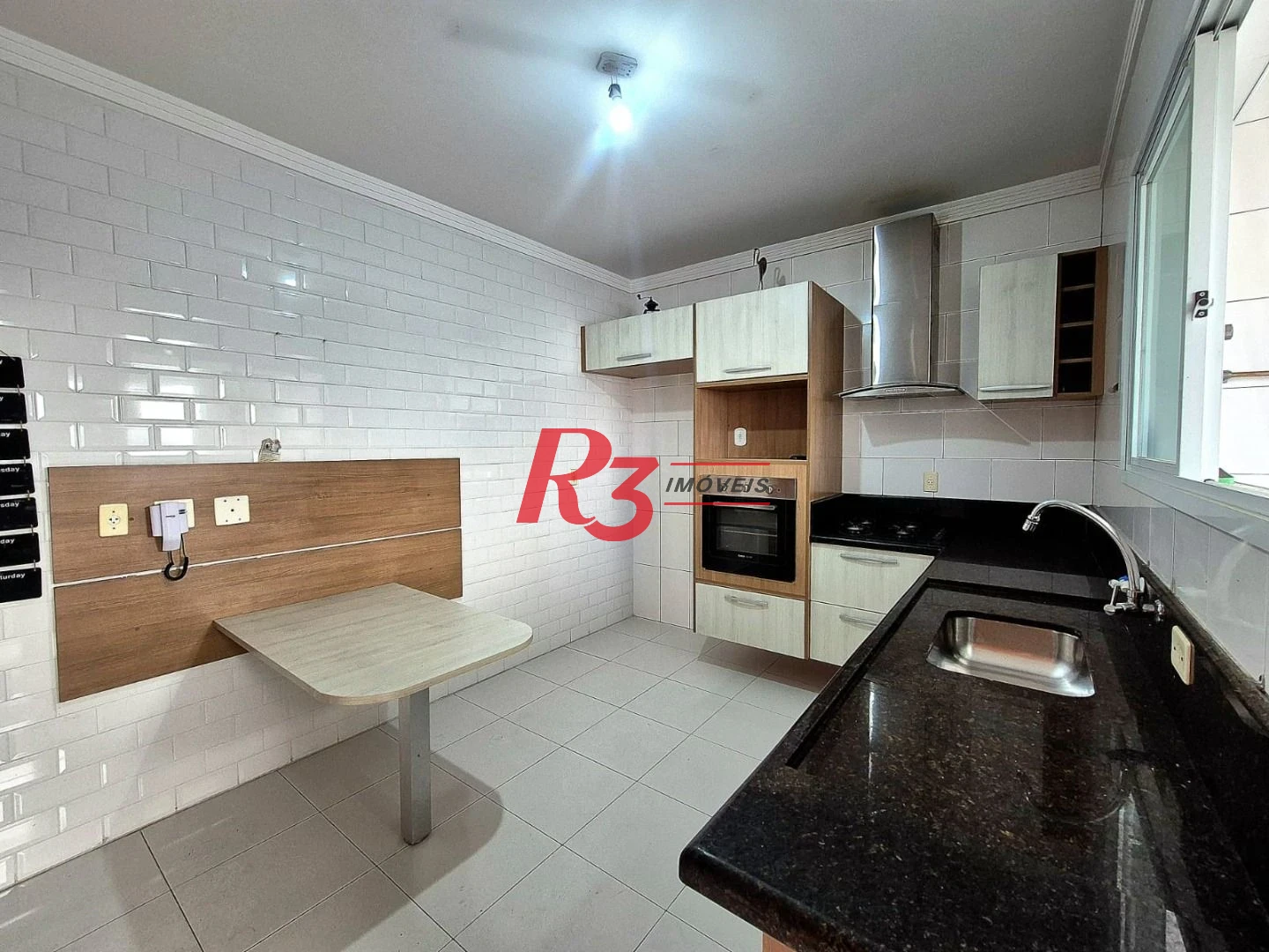 Casa com 3 dormitórios à venda, 165 m² por R$ 1.060.000,00 - Campo Grande - Santos/SP