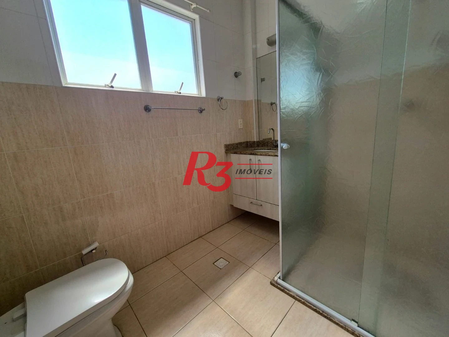 Casa com 3 dormitórios à venda, 165 m² por R$ 1.060.000,00 - Campo Grande - Santos/SP