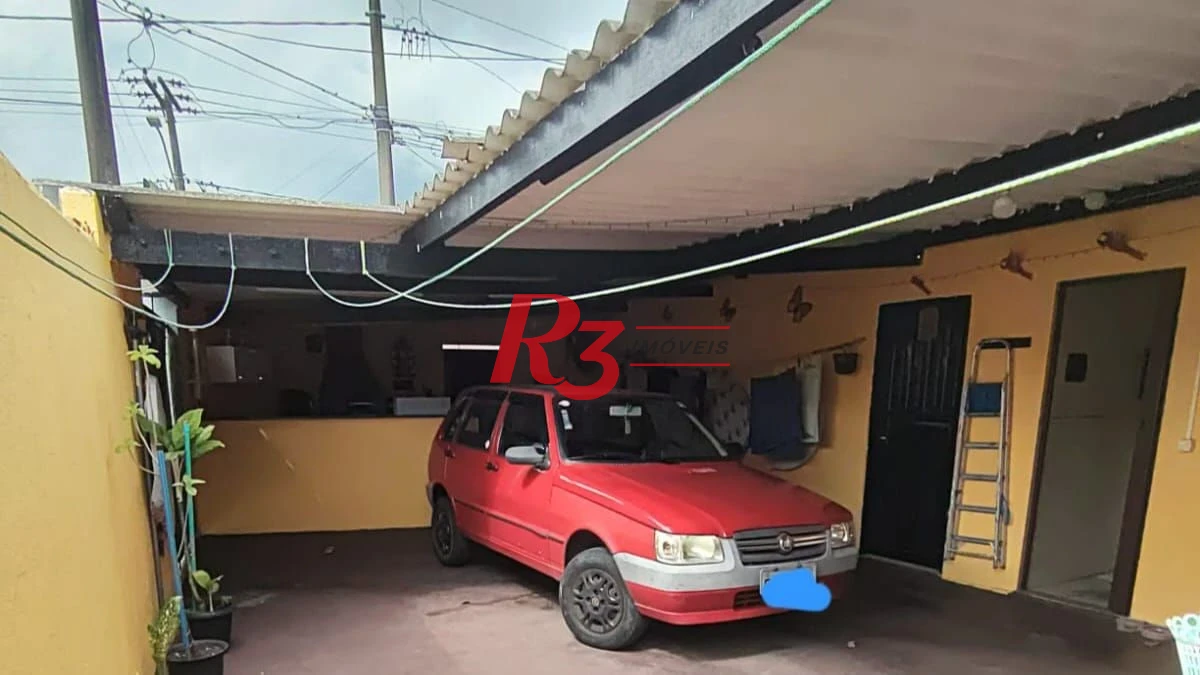 Casa com 3 dormitórios à venda, 200 m² por R$ 650.000,00 - Areia Branca - Santos/SP