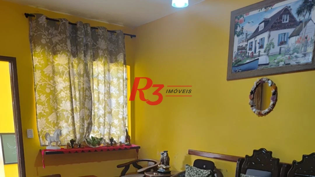 Casa com 3 dormitórios à venda, 200 m² por R$ 650.000,00 - Areia Branca - Santos/SP