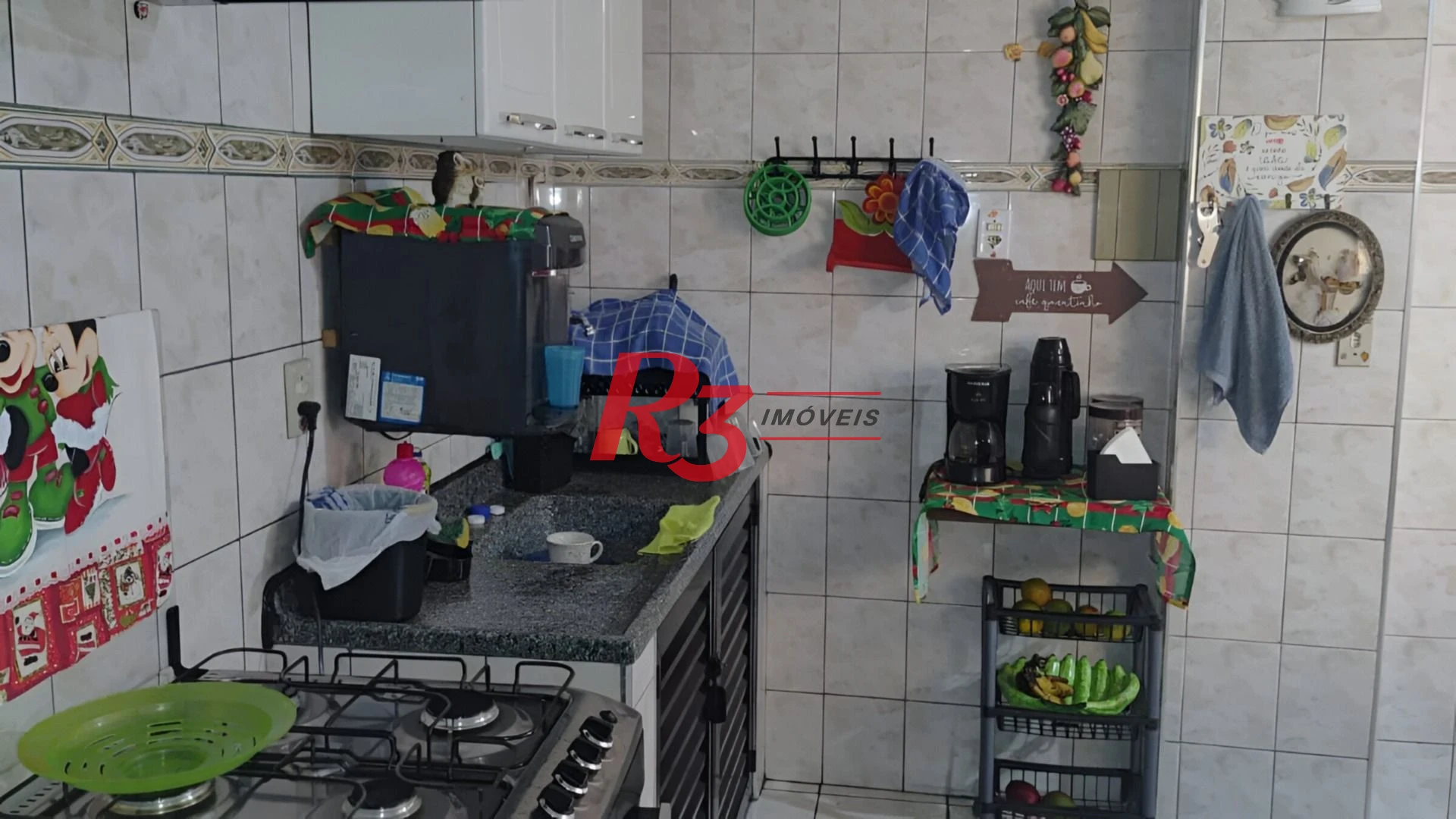 Casa com 3 dormitórios à venda, 200 m² por R$ 650.000,00 - Areia Branca - Santos/SP