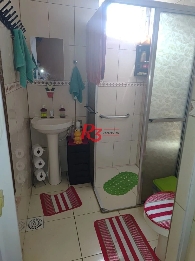 Casa com 3 dormitórios à venda, 200 m² por R$ 650.000,00 - Areia Branca - Santos/SP