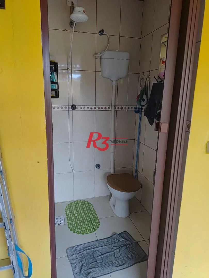 Casa com 3 dormitórios à venda, 200 m² por R$ 650.000,00 - Areia Branca - Santos/SP