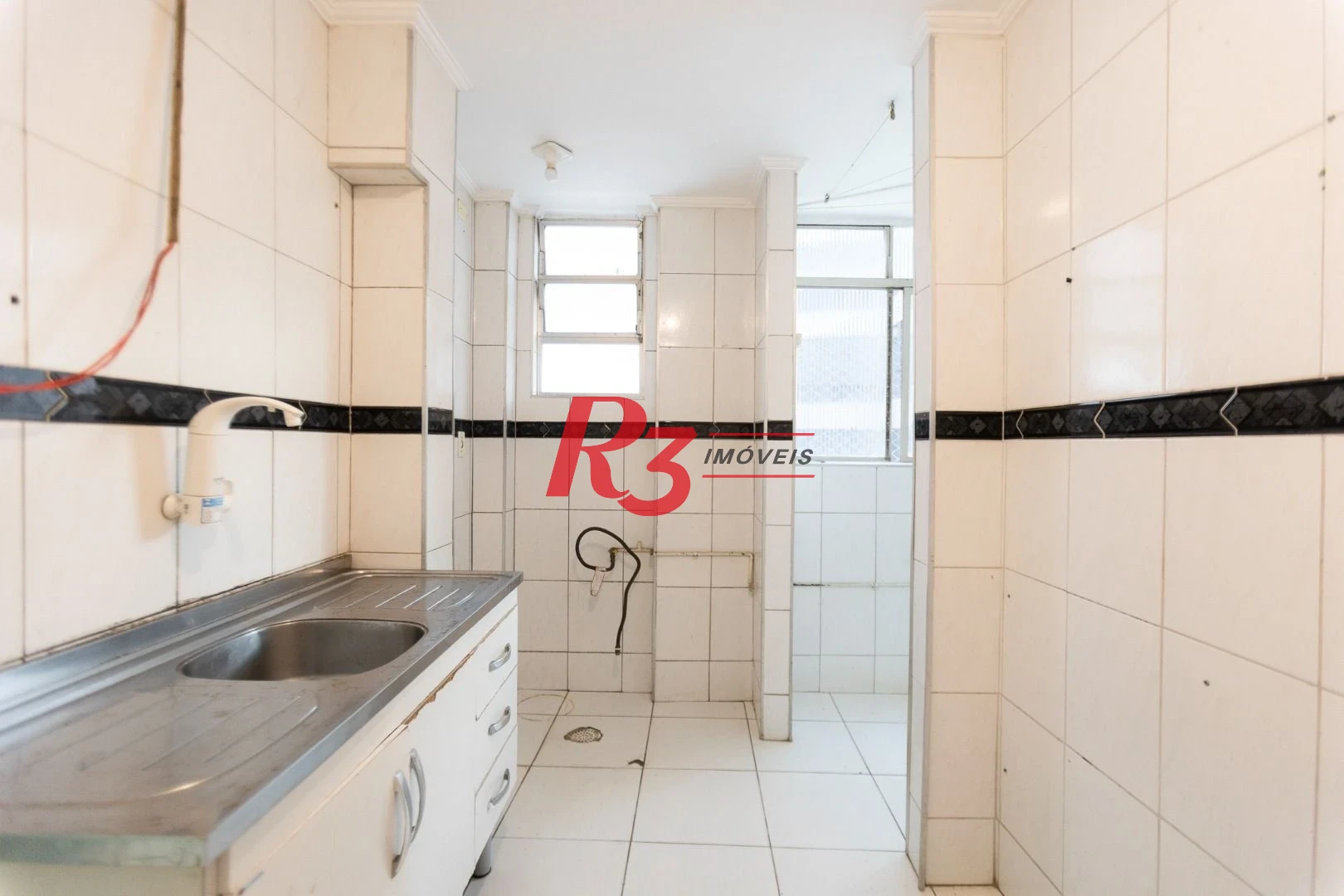 Apartamento com 2 dormitórios à venda, 90 m² por R$ 510.000,00 - Gonzaga - Santos/SP