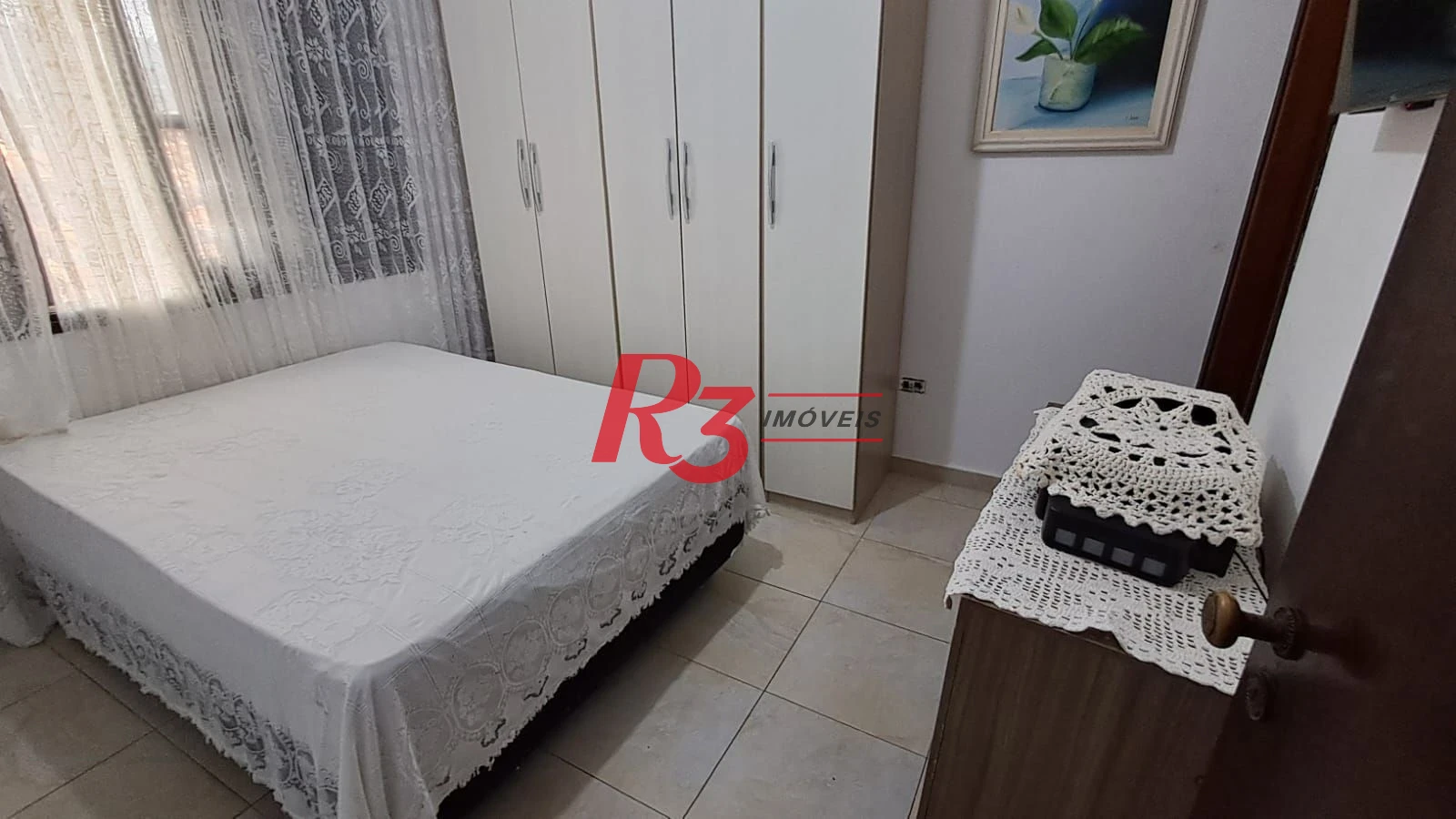 Sobrado com 4 dormitórios à venda, 268 m² por R$ 1.200.000,00 - Solemar - Praia Grande/SP