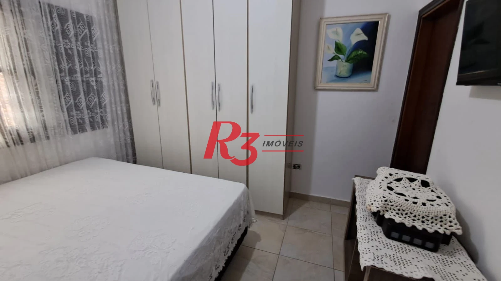 Sobrado com 4 dormitórios à venda, 268 m² por R$ 1.200.000,00 - Solemar - Praia Grande/SP