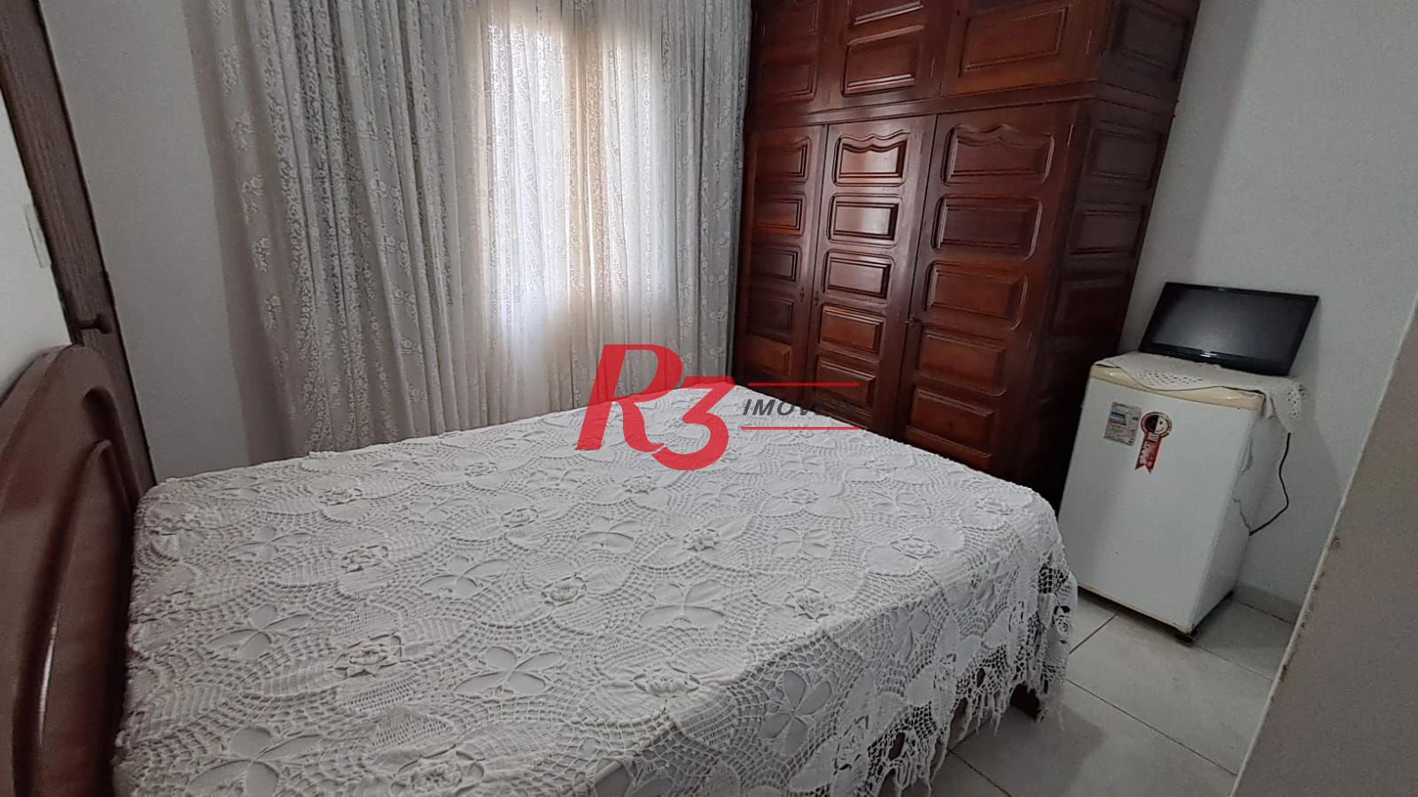Sobrado com 4 dormitórios à venda, 268 m² por R$ 1.200.000,00 - Solemar - Praia Grande/SP
