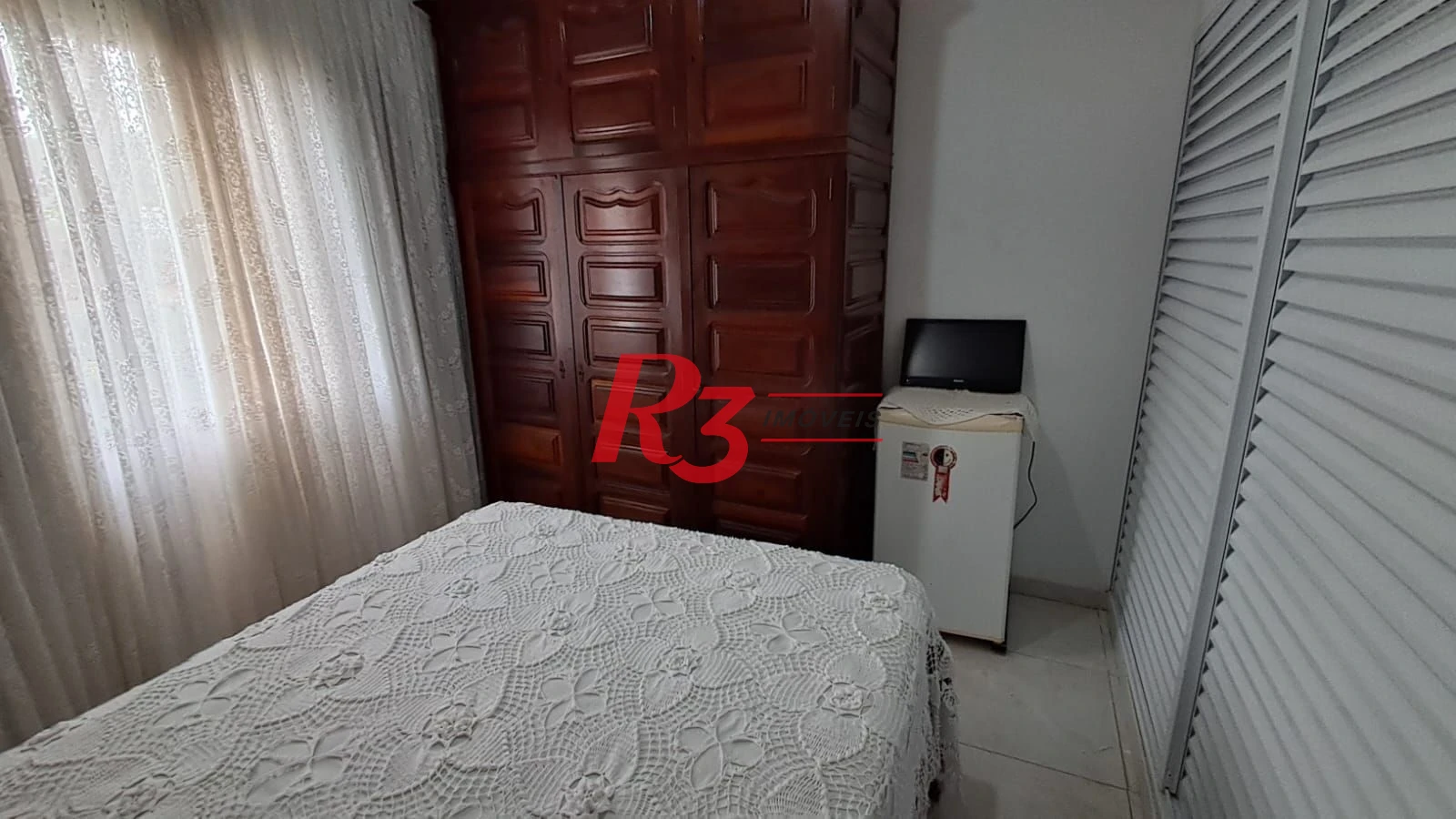 Sobrado com 4 dormitórios à venda, 268 m² por R$ 1.200.000,00 - Solemar - Praia Grande/SP