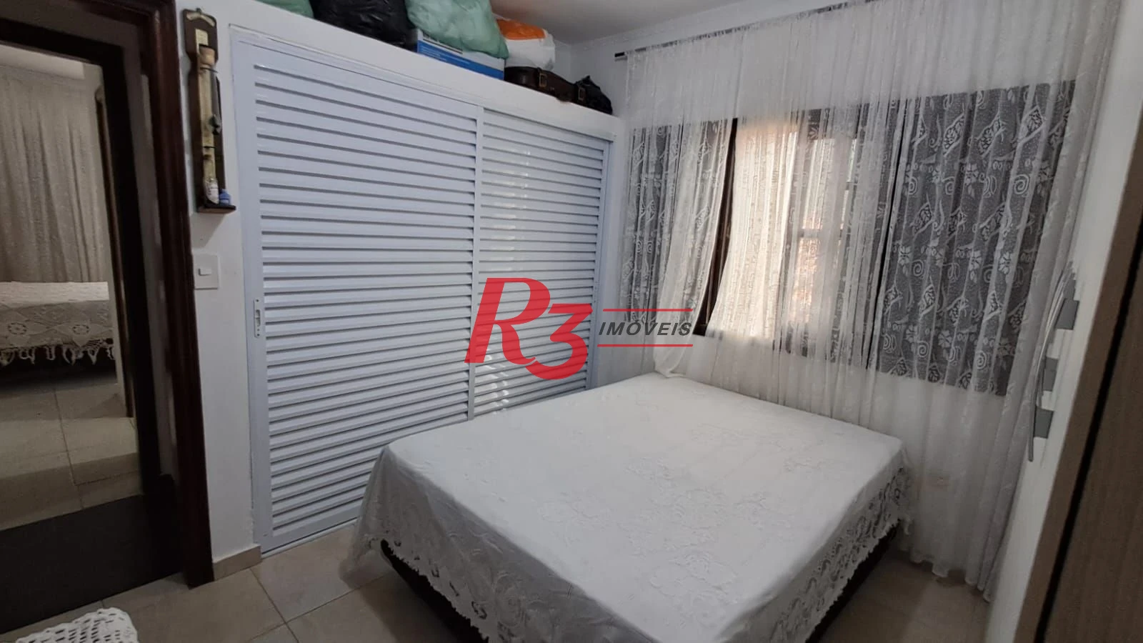 Sobrado com 4 dormitórios à venda, 268 m² por R$ 1.200.000,00 - Solemar - Praia Grande/SP