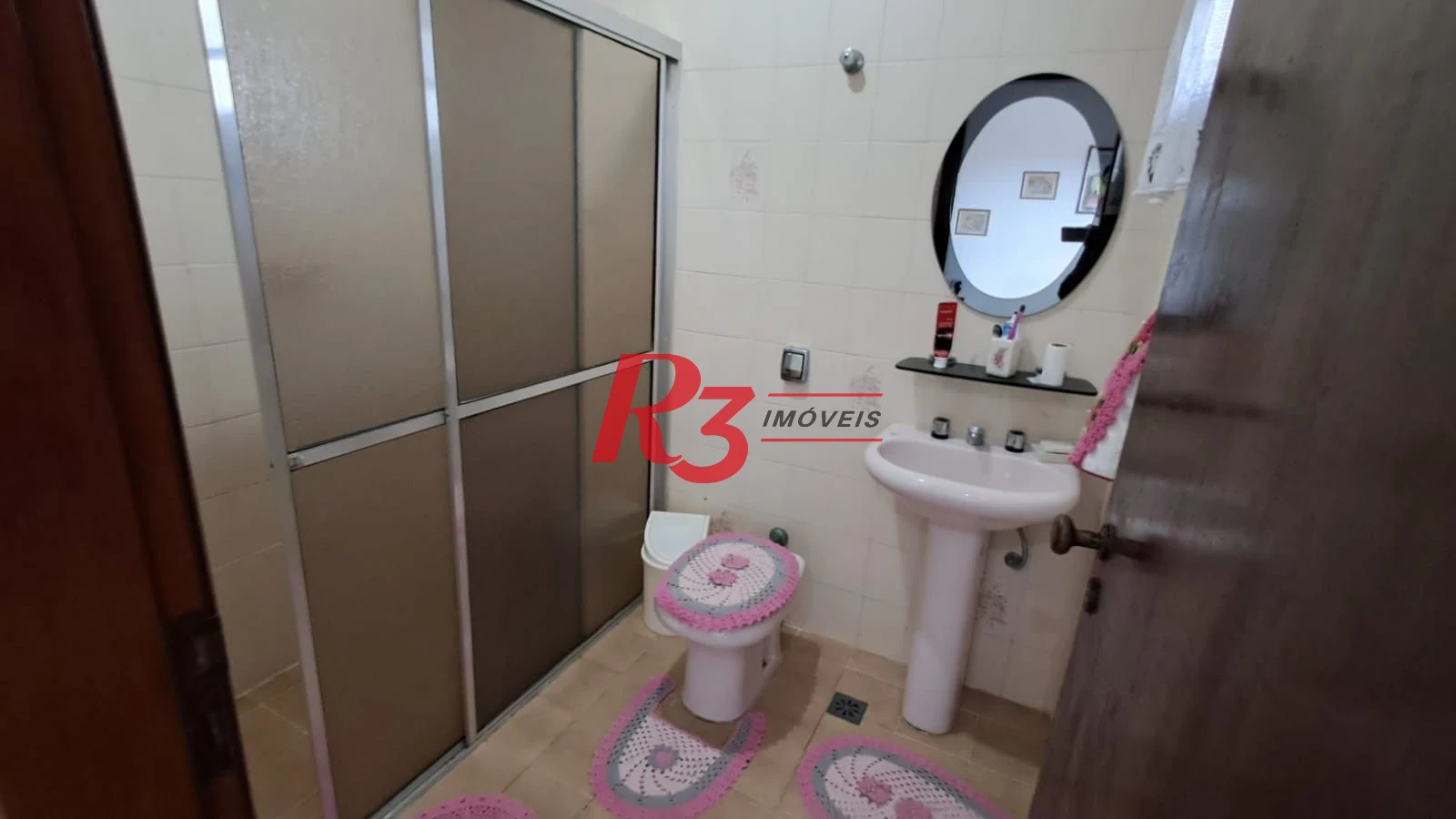 Sobrado com 4 dormitórios à venda, 268 m² por R$ 1.200.000,00 - Solemar - Praia Grande/SP