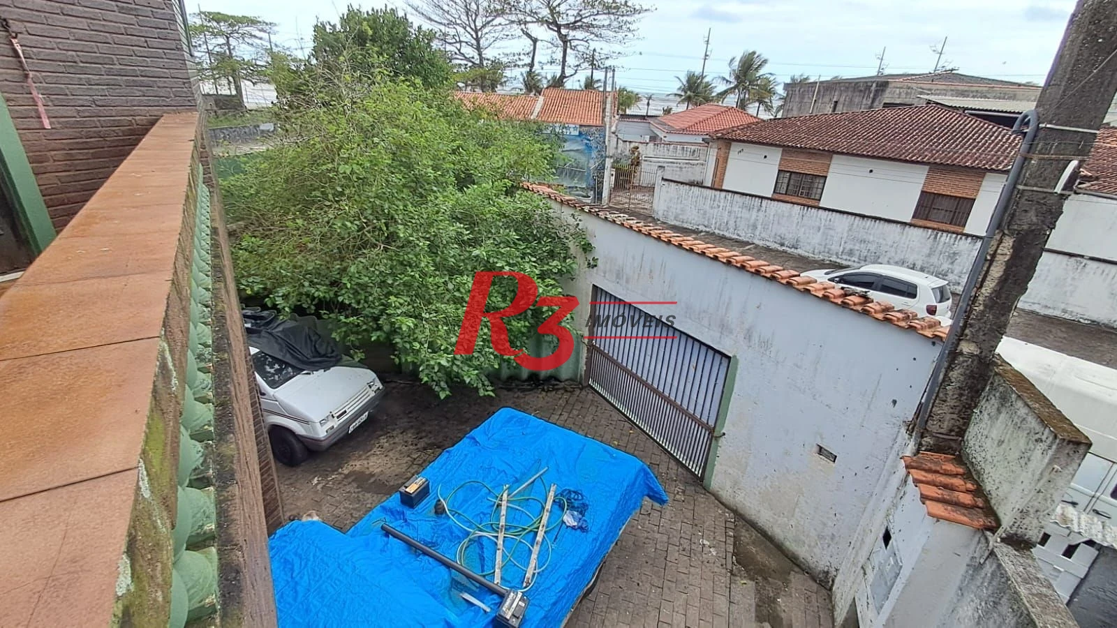 Sobrado com 4 dormitórios à venda, 268 m² por R$ 1.200.000,00 - Solemar - Praia Grande/SP