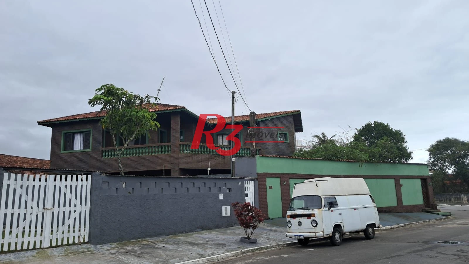 Sobrado com 4 dormitórios à venda, 268 m² por R$ 1.200.000,00 - Solemar - Praia Grande/SP