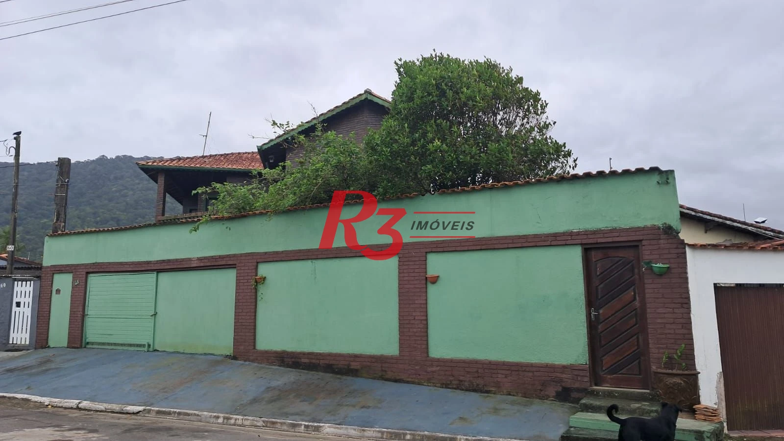 Sobrado com 4 dormitórios à venda, 268 m² por R$ 1.200.000,00 - Solemar - Praia Grande/SP