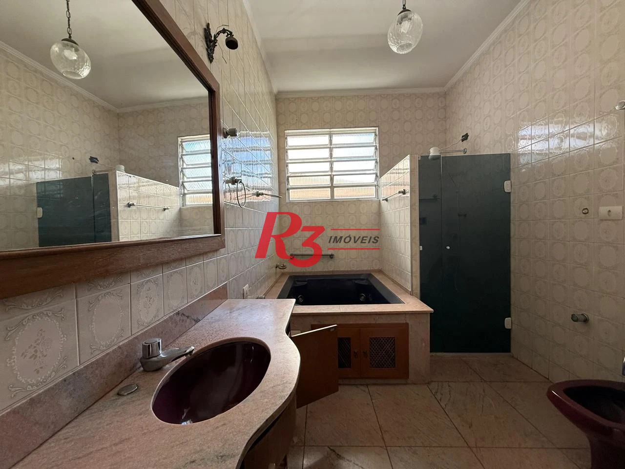Sobrado com 3 dormitórios para alugar, 164 m² por R$ 8.000,00/mês - Embaré - Santos/SP