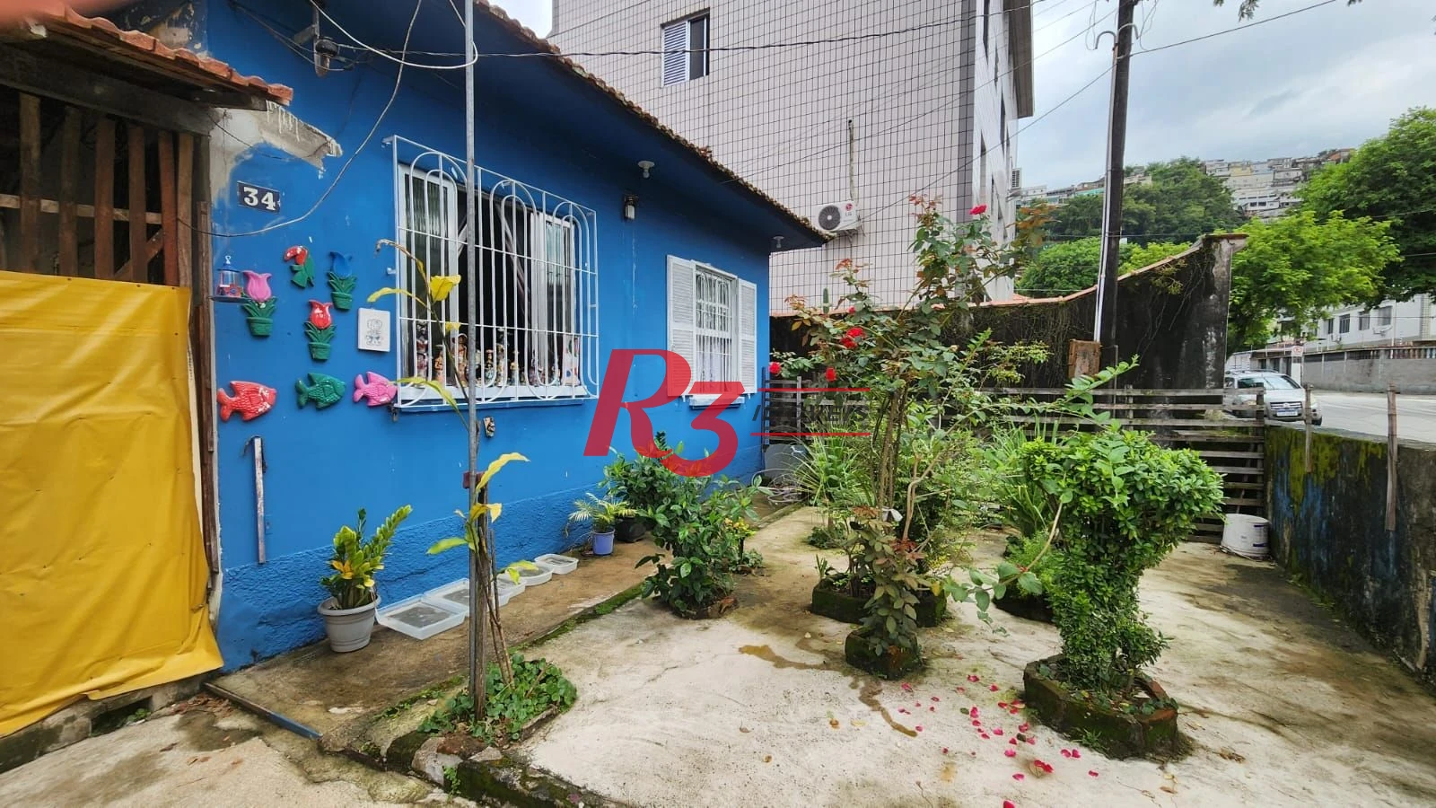 Casa com 3 dormitórios à venda, 100 m² por R$ 500.000,00 - Jabaquara - Santos/SP