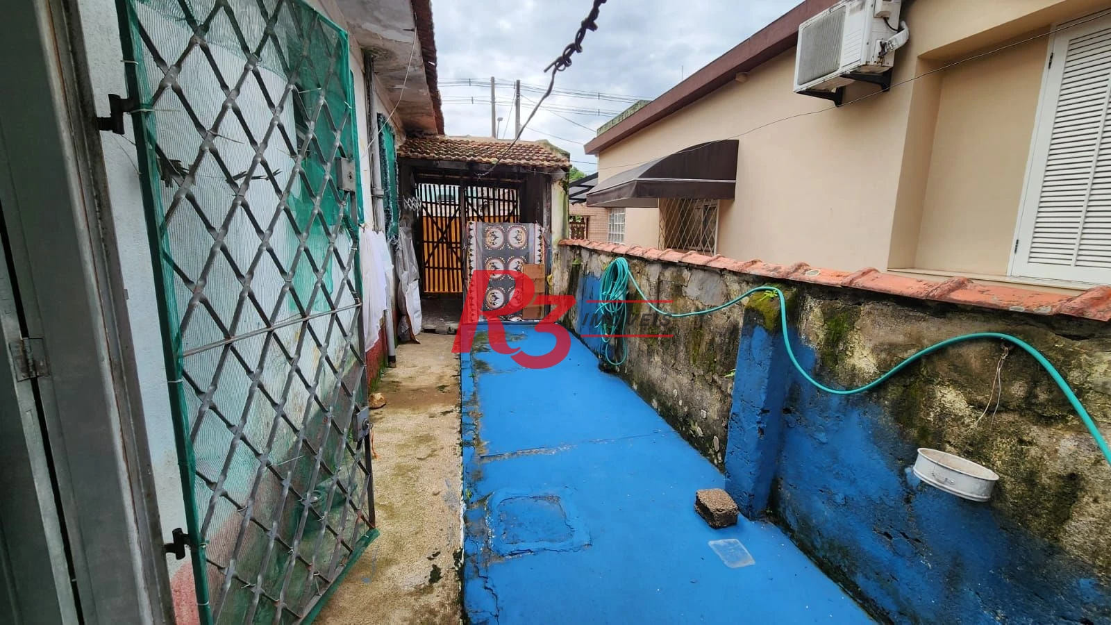 Casa com 3 dormitórios à venda, 100 m² por R$ 500.000,00 - Jabaquara - Santos/SP