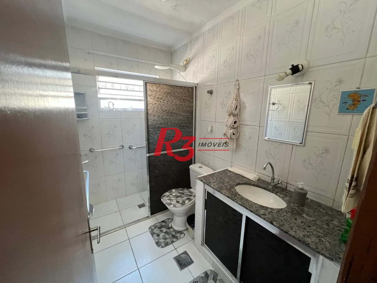 Casa com 3 dormitórios à venda, 199 m² por R$ 540.000,00 - Rádio Club - Santos/SP