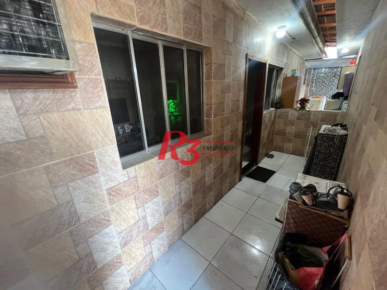 Casa com 3 dormitórios à venda, 199 m² por R$ 540.000,00 - Rádio Club - Santos/SP