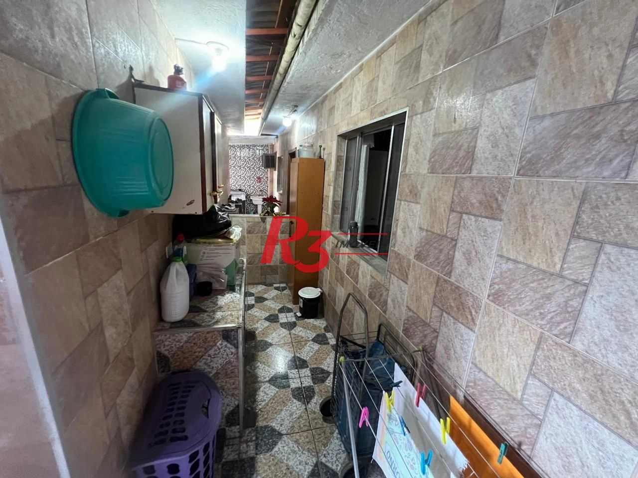 Casa com 3 dormitórios à venda, 199 m² por R$ 540.000,00 - Rádio Club - Santos/SP