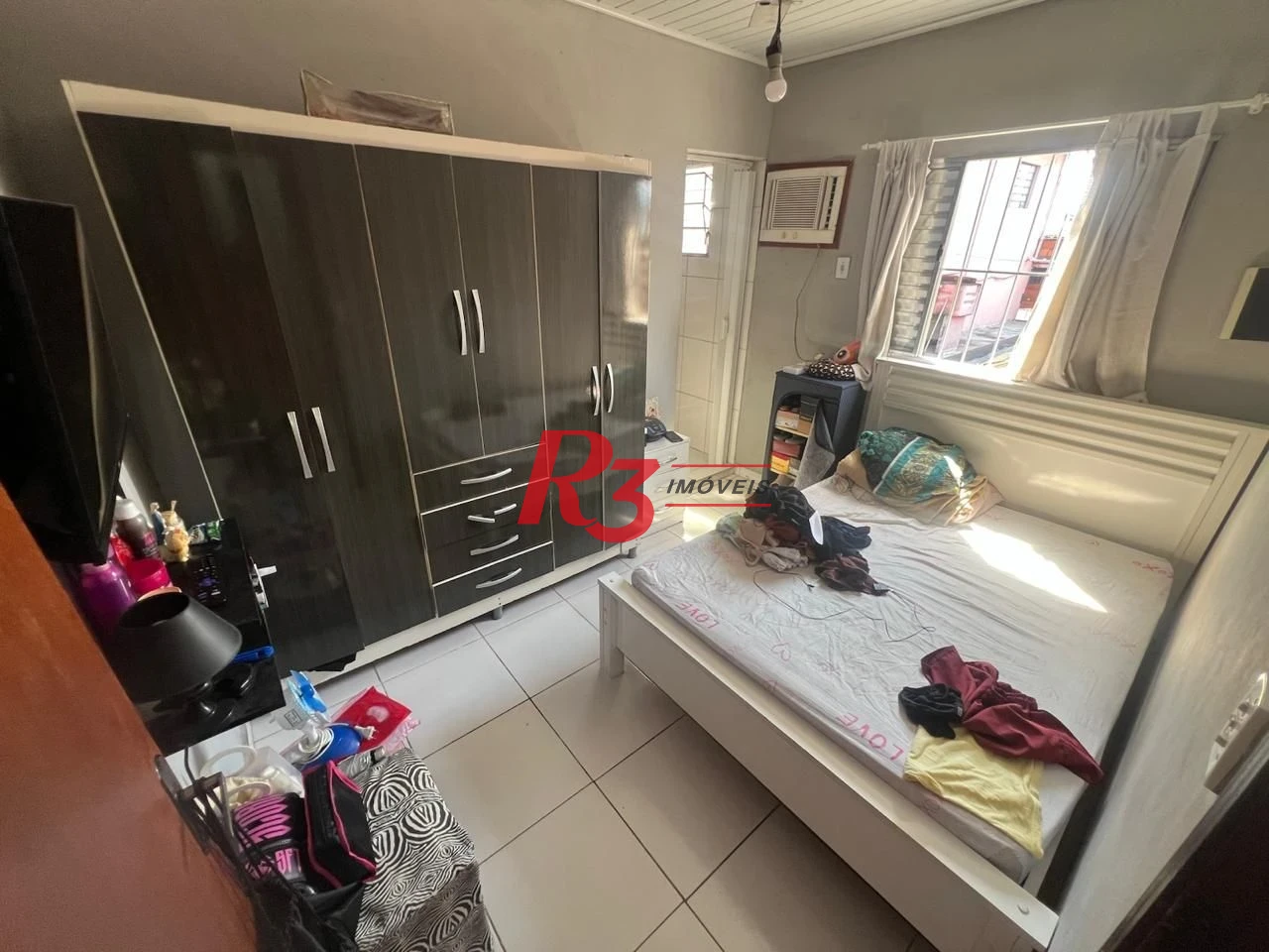 Casa com 3 dormitórios à venda, 199 m² por R$ 540.000,00 - Rádio Club - Santos/SP