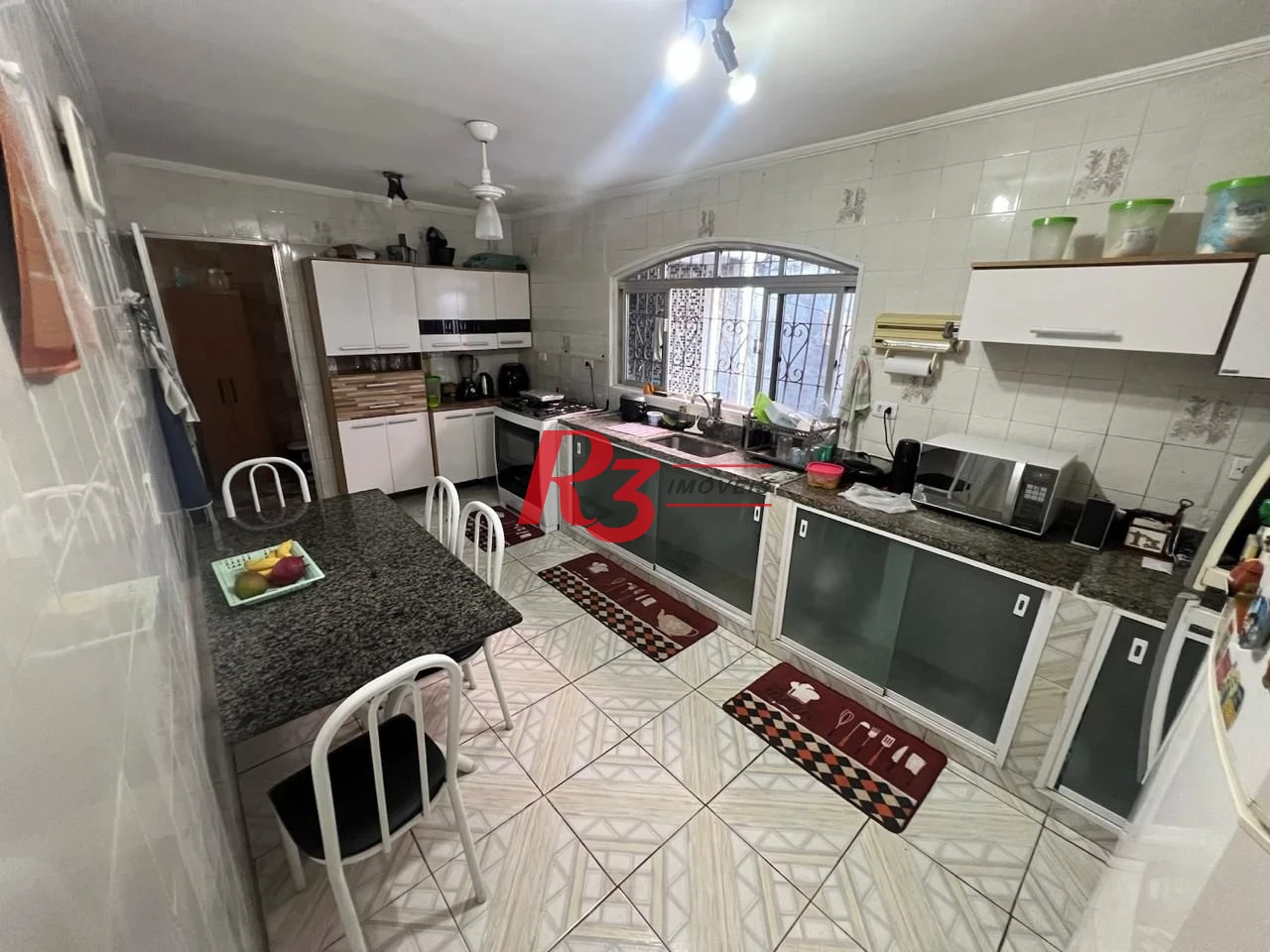 Casa com 3 dormitórios à venda, 199 m² por R$ 540.000,00 - Rádio Club - Santos/SP