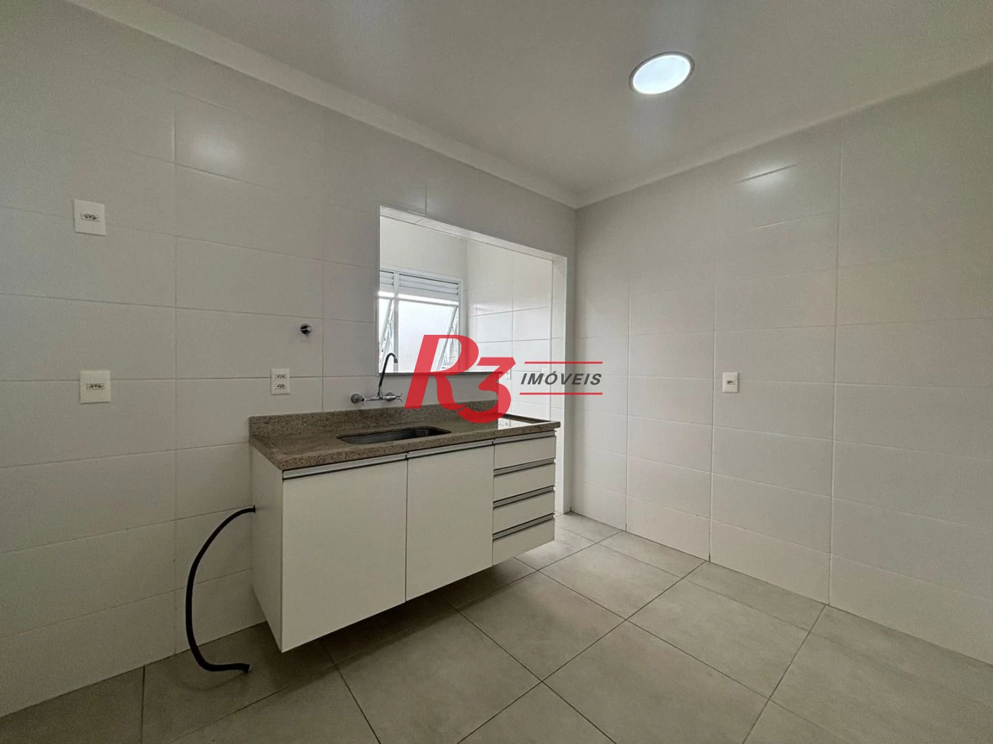 Apartamento com 1 dormitório para alugar, 53 m² - Embaré - Santos/SP