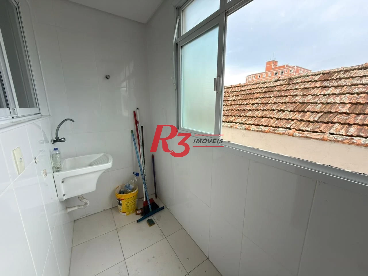 Casa com 3 dormitórios à venda, 350 m² por R$ 1.300.000,00 - Embaré - Santos/SP