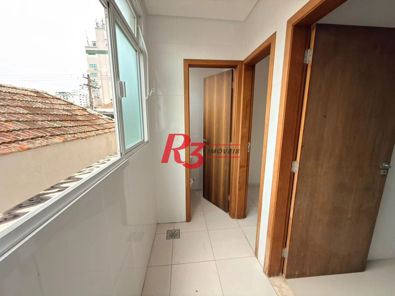 Casa com 3 dormitórios à venda, 350 m² por R$ 1.300.000,00 - Embaré - Santos/SP