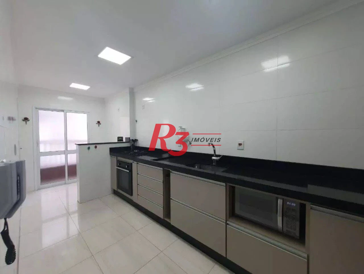 Apartamento com 2 dormitórios à venda, 86 m² por R$ 590.000,00 - Vila Guilhermina - Praia Grande/SP