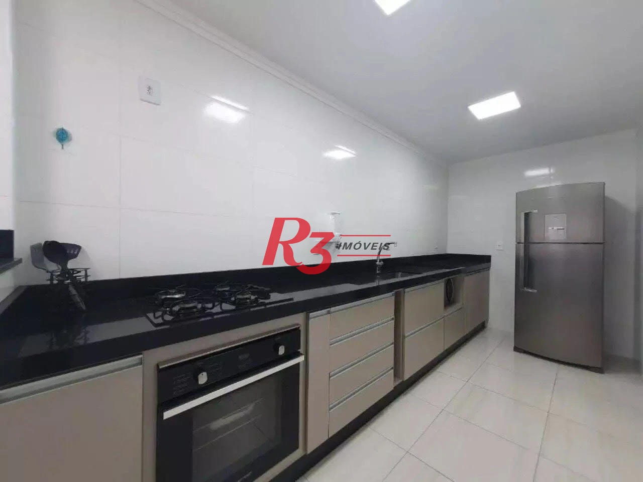Apartamento com 2 dormitórios à venda, 86 m² por R$ 590.000,00 - Vila Guilhermina - Praia Grande/SP