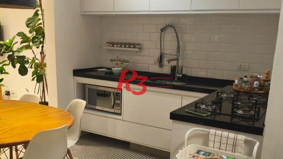 Sobrado com 3 dormitórios à venda, 102 m² por R$ 719.000,00 - Campo Grande - Santos/SP