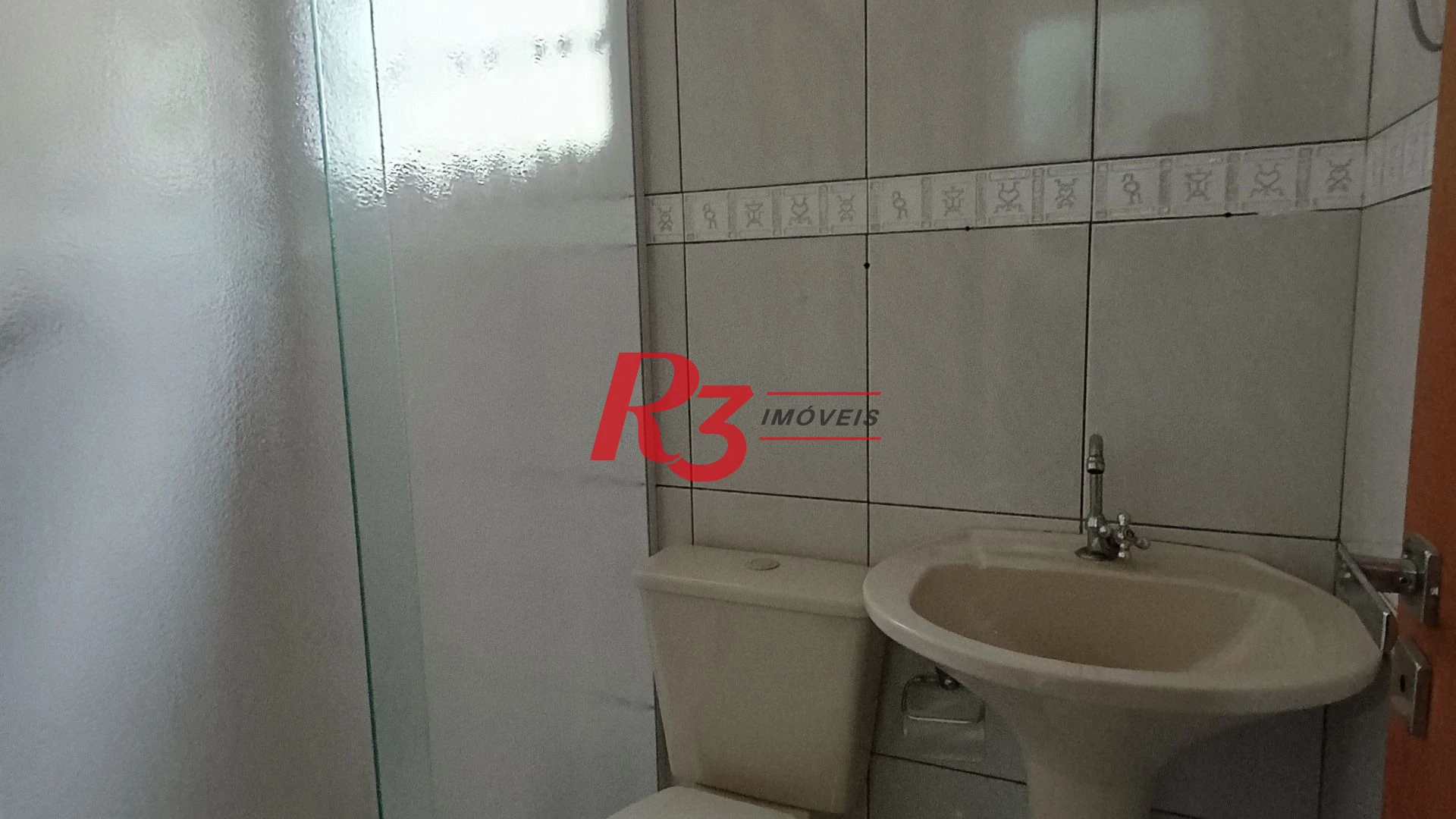 Casa com 3 dormitórios à venda, 120 m² por R$ 590.000,00 - Santa Maria - Santos/SP