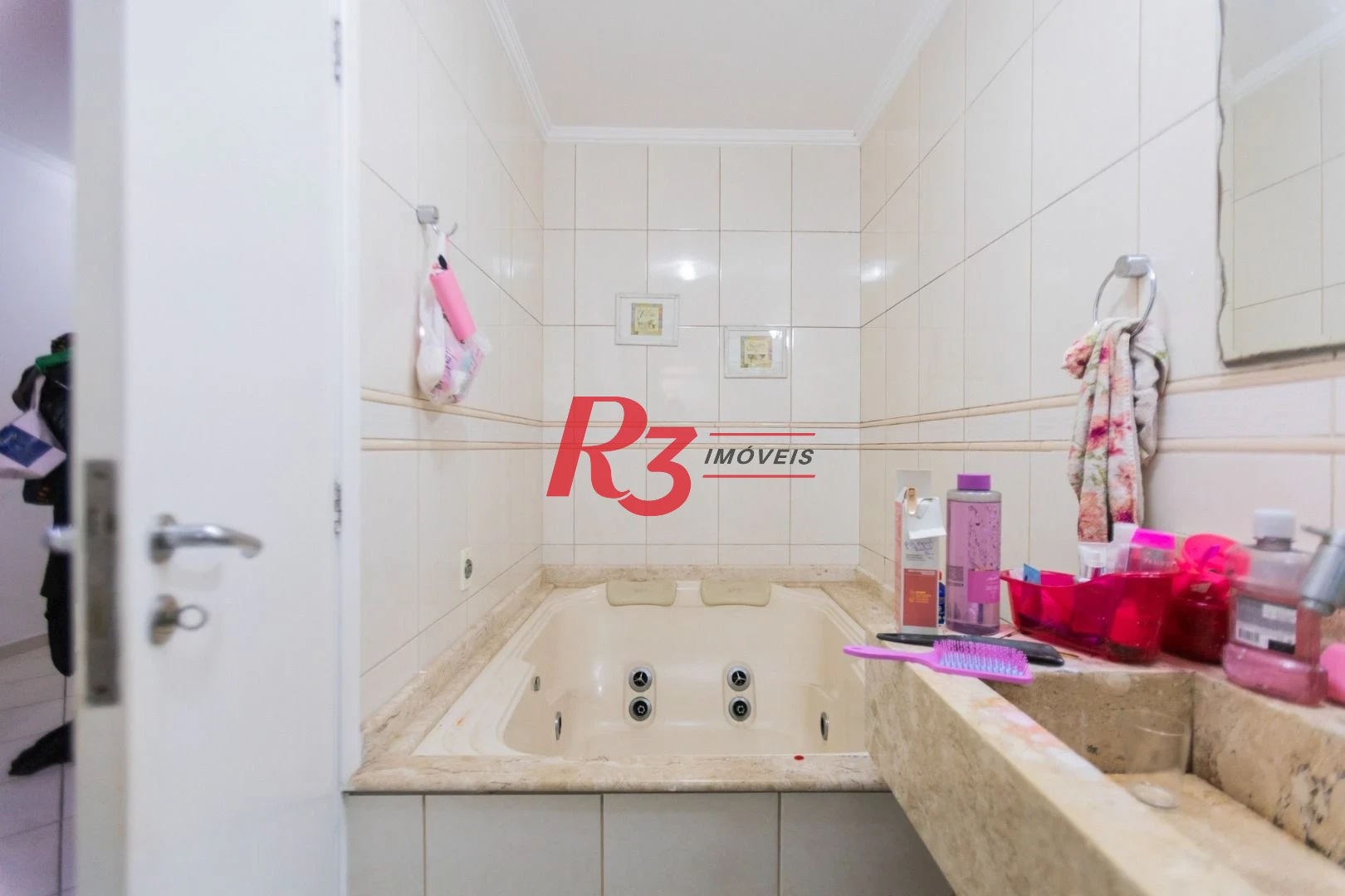 Casa com 3 dormitórios à venda, 186 m² por R$ 1.490.000,00 - Campo Grande - Santos/SP