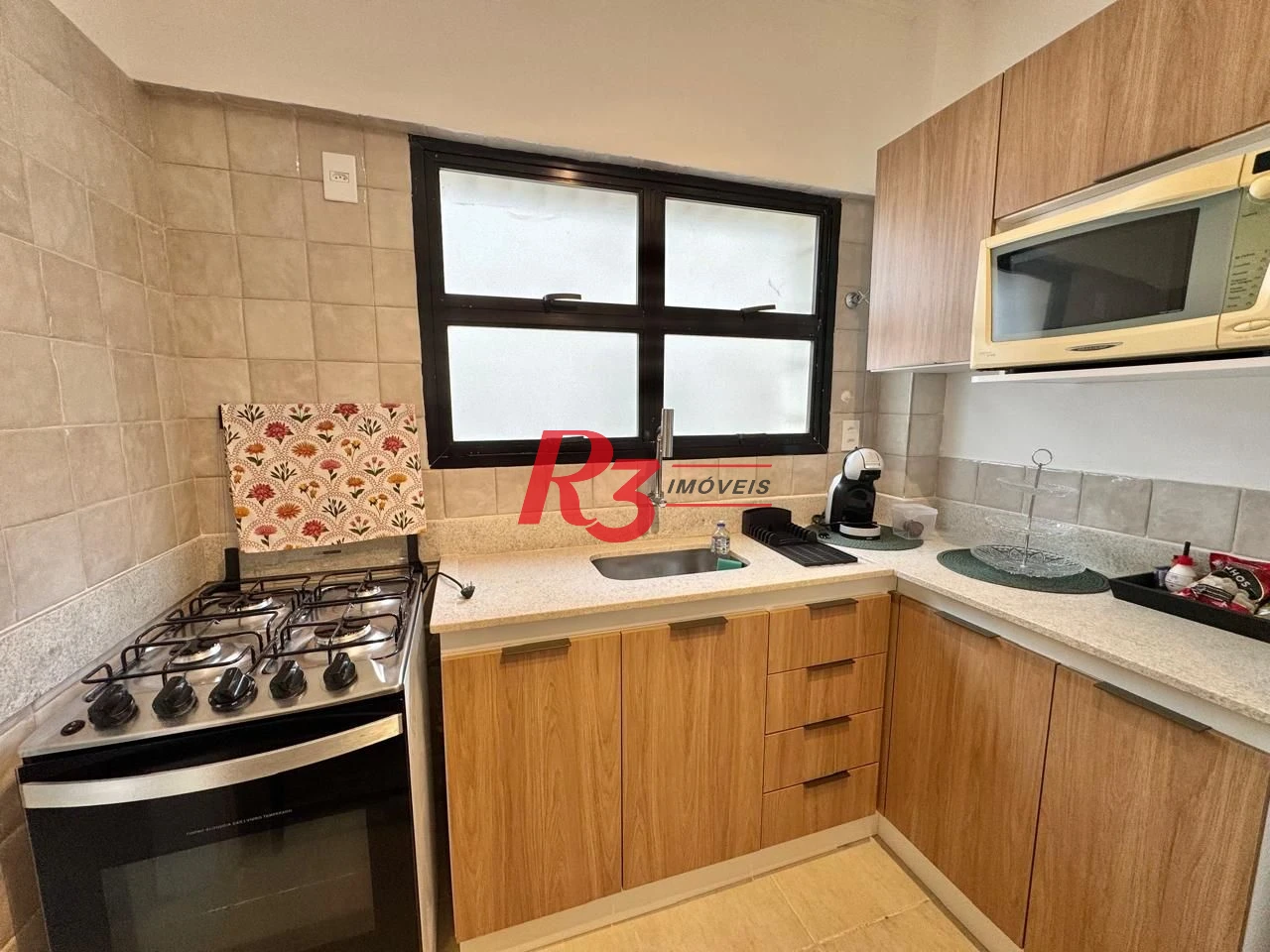 Apartamento com 1 dormitório para alugar, 65 m² por R$ 4.200,00/mês - Embaré - Santos/SP