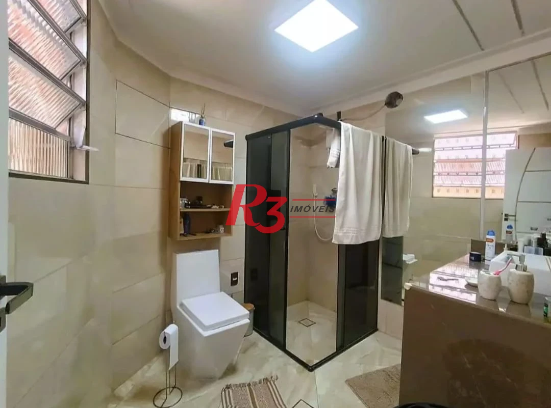 Sobrado com 3 dormitórios à venda, 114 m² por R$ 895.000,00 - Encruzilhada - Santos/SP