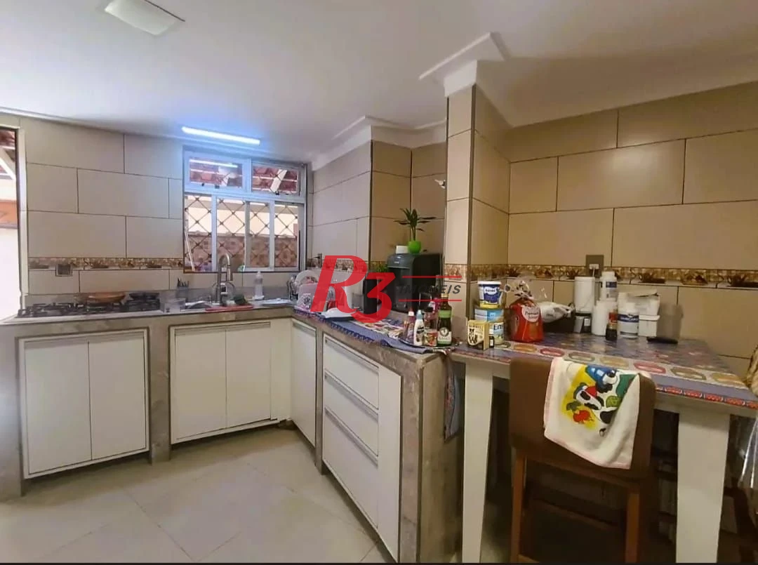 Sobrado com 3 dormitórios à venda, 114 m² por R$ 895.000,00 - Encruzilhada - Santos/SP