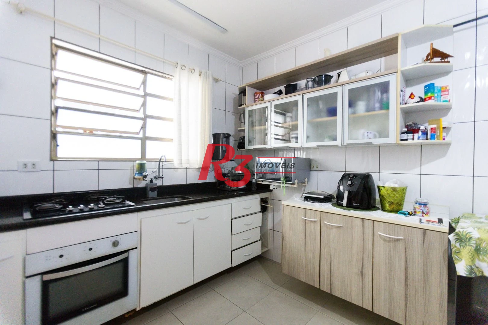 Casa com 3 dormitórios para alugar, 160 m² por R$ 7.000,00/mês - Ponta da Praia - Santos/SP