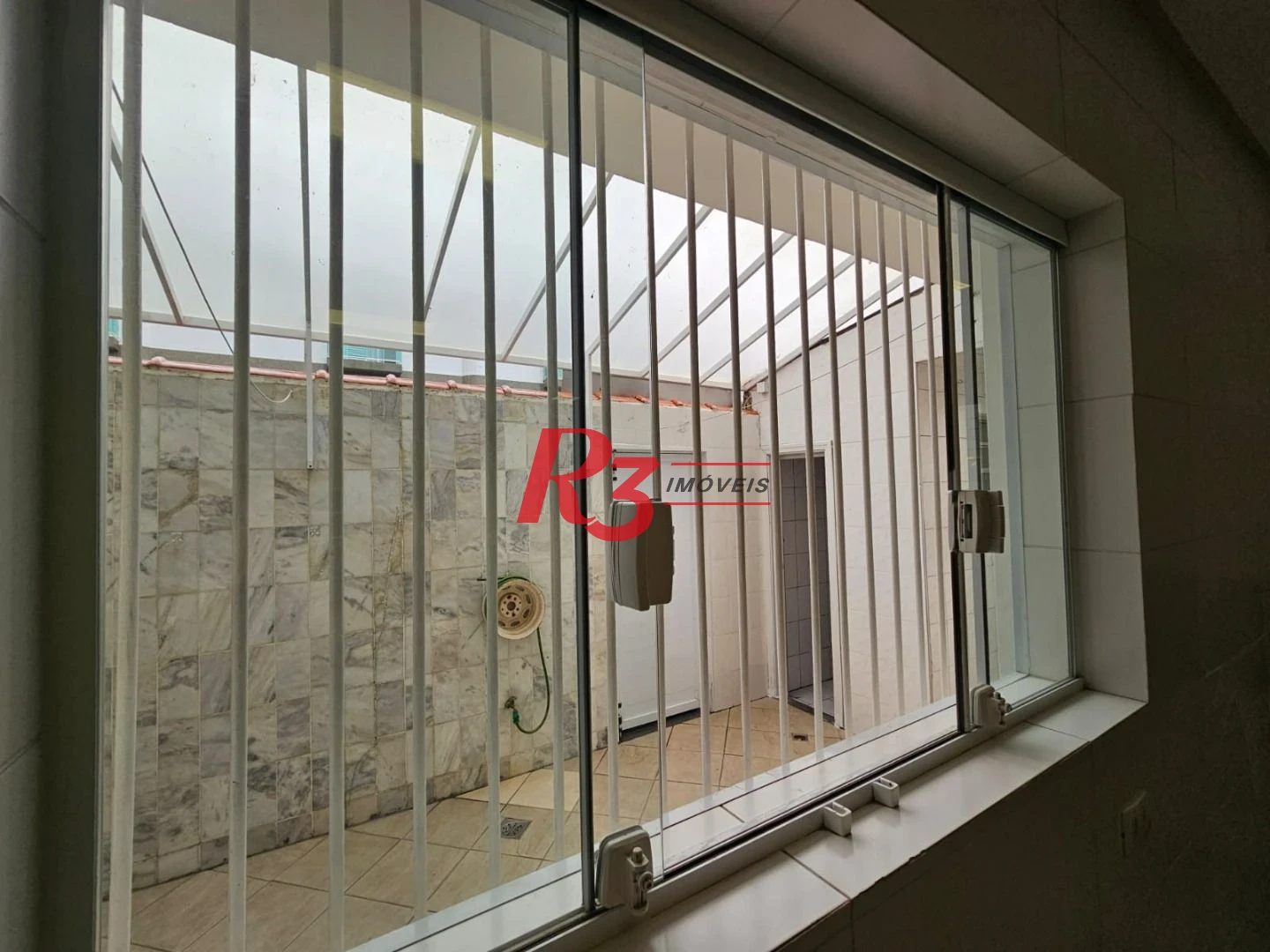 Sobrado à venda, 230 m² por R$ 1.920.000,00 - Ponta da Praia - Santos/SP