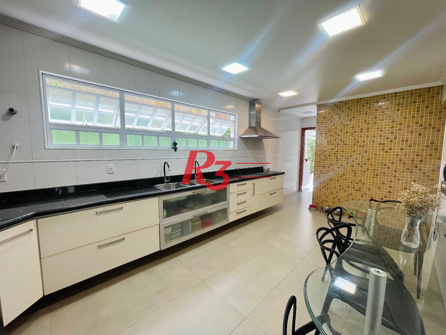 Sobrado à venda, 457 m² por R$ 6.500.000,00 - Gonzaga - Santos/SP