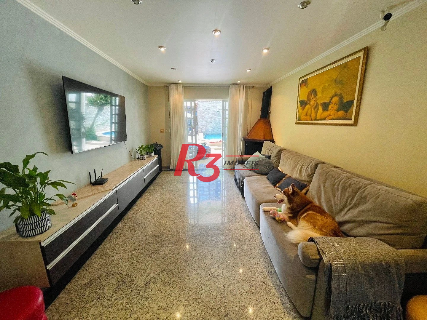 Sobrado à venda, 457 m² por R$ 6.500.000,00 - Gonzaga - Santos/SP