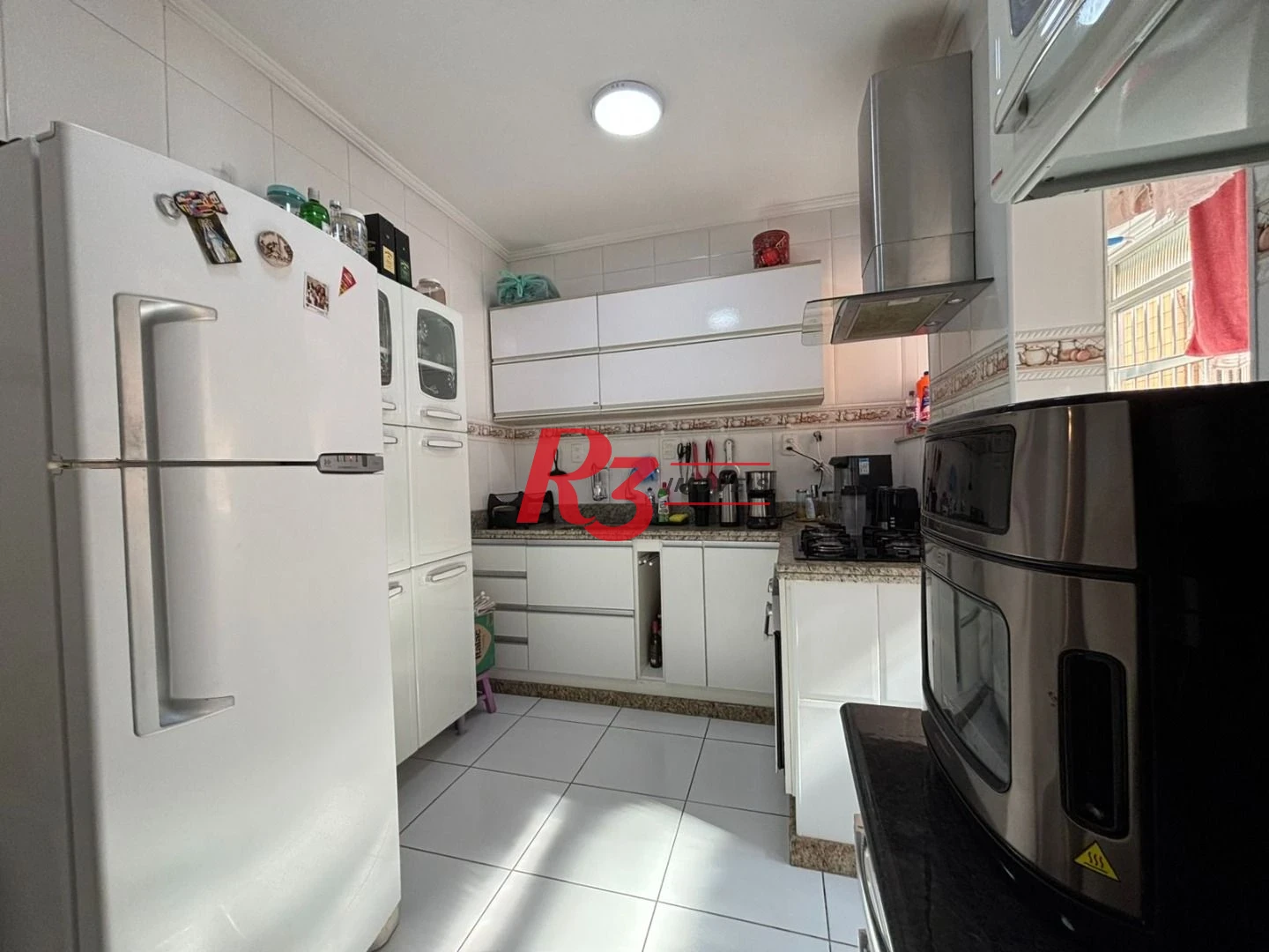 Apartamento com 3 dormitórios à venda, 98 m² por R$ 500.000,00 - Gonzaga - Santos/SP