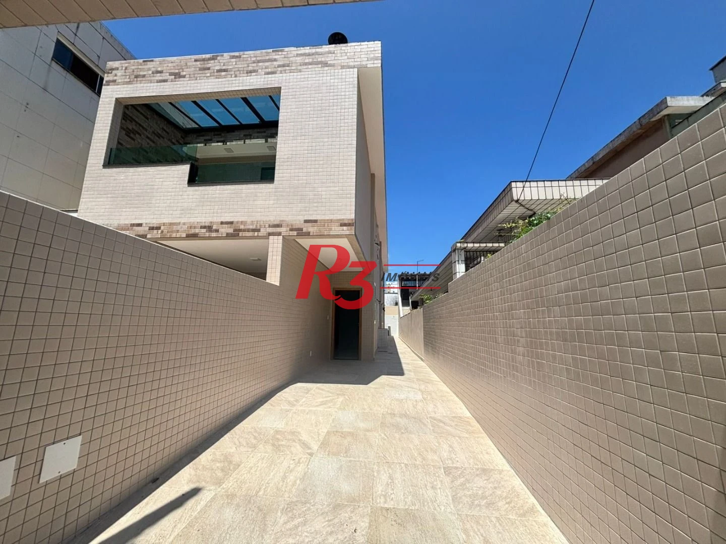 Casa com 3 dormitórios à venda, 115 m² por R$ 1.100.000,00 - Aparecida - Santos/SP