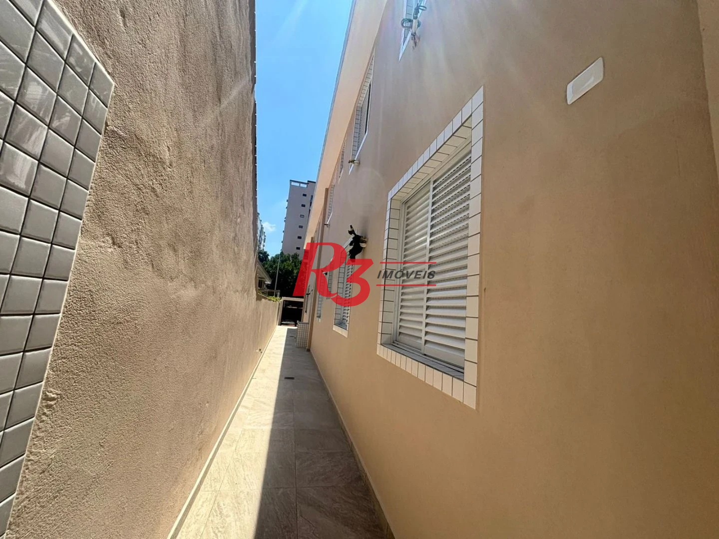 Casa com 3 dormitórios à venda, 115 m² por R$ 1.100.000,00 - Aparecida - Santos/SP