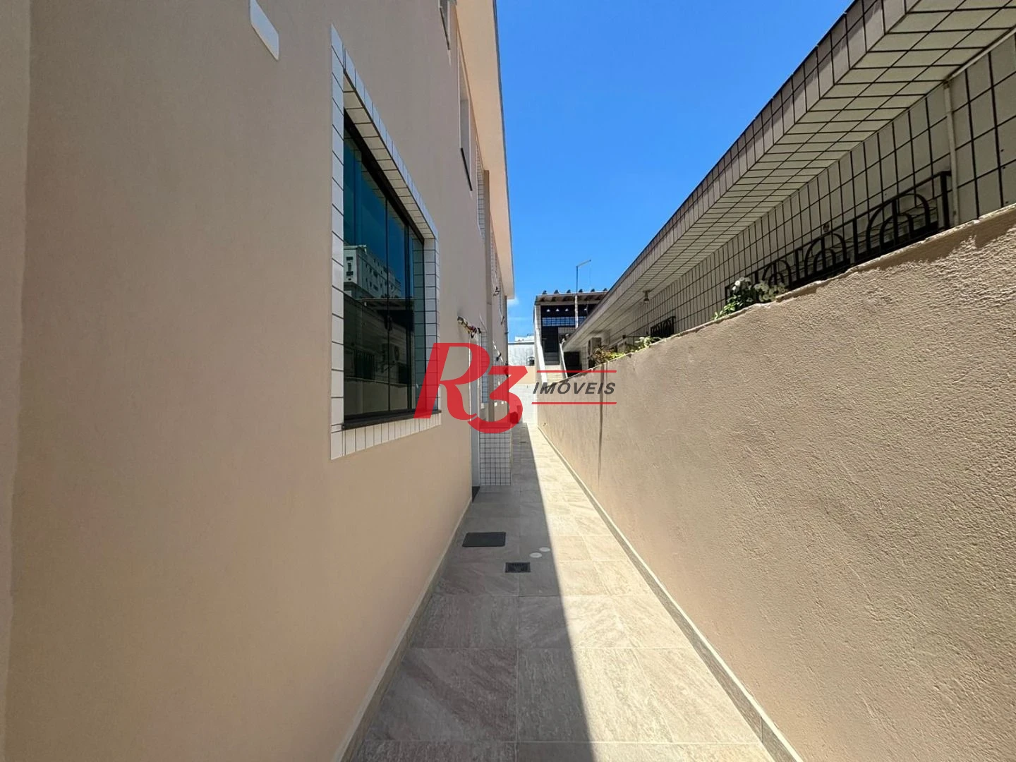 Casa com 3 dormitórios à venda, 115 m² por R$ 1.100.000,00 - Aparecida - Santos/SP