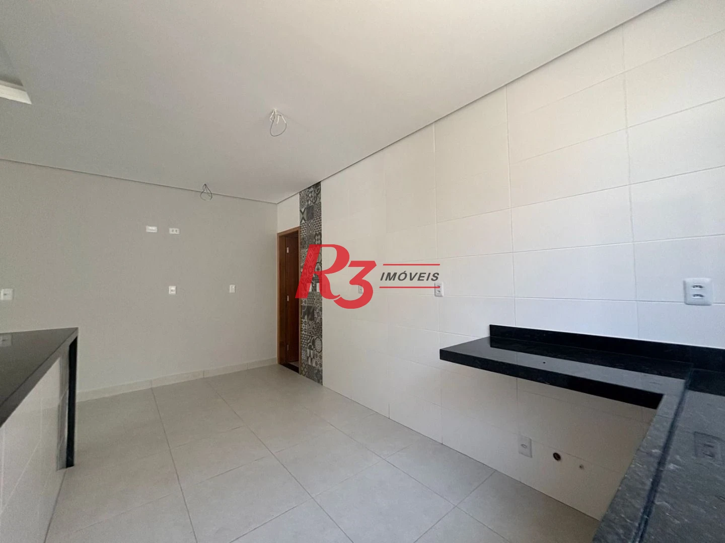 Casa com 3 dormitórios à venda, 115 m² por R$ 1.100.000,00 - Aparecida - Santos/SP